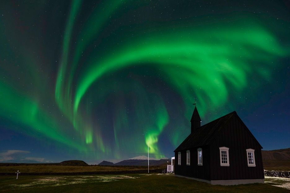 Northern lights church at snæfellsnes peninsula iceland.